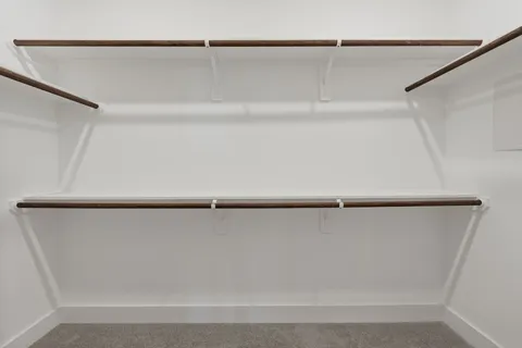 a view of outdoor space with wooden fence