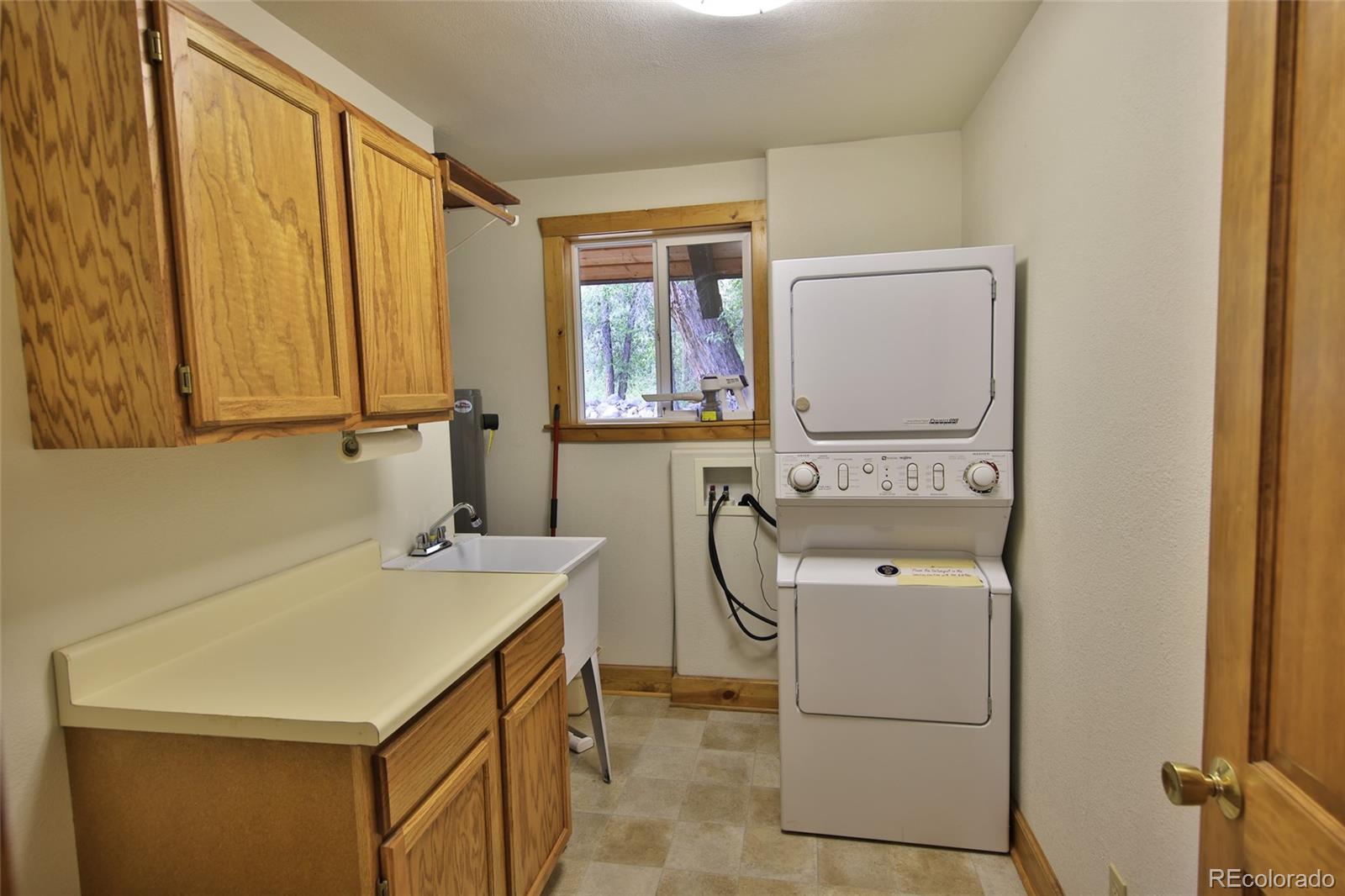 9681-56 56 2/10 Road Molina, CO 81646 - Photo 16 of 39 a utility room with dryer and washer