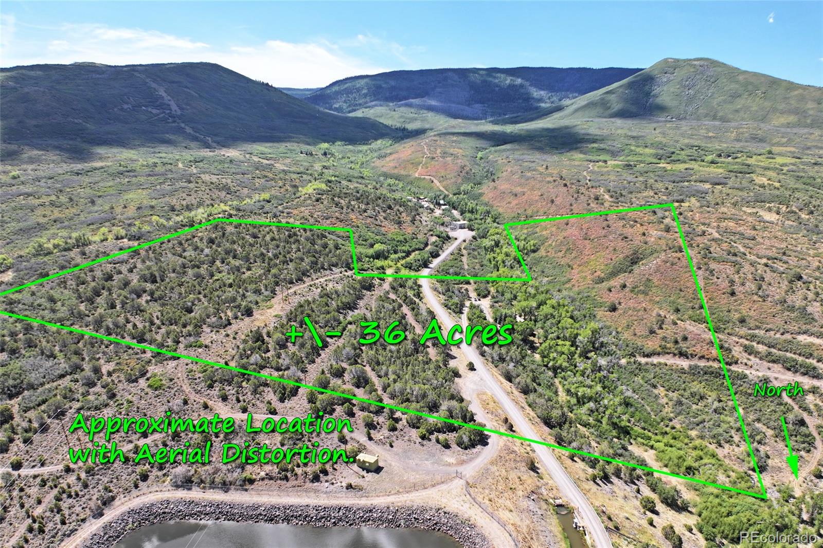 9681-56 56 2/10 Road Molina, CO 81646 - Photo 5 of 39 a view of a lush green hillside and a houses