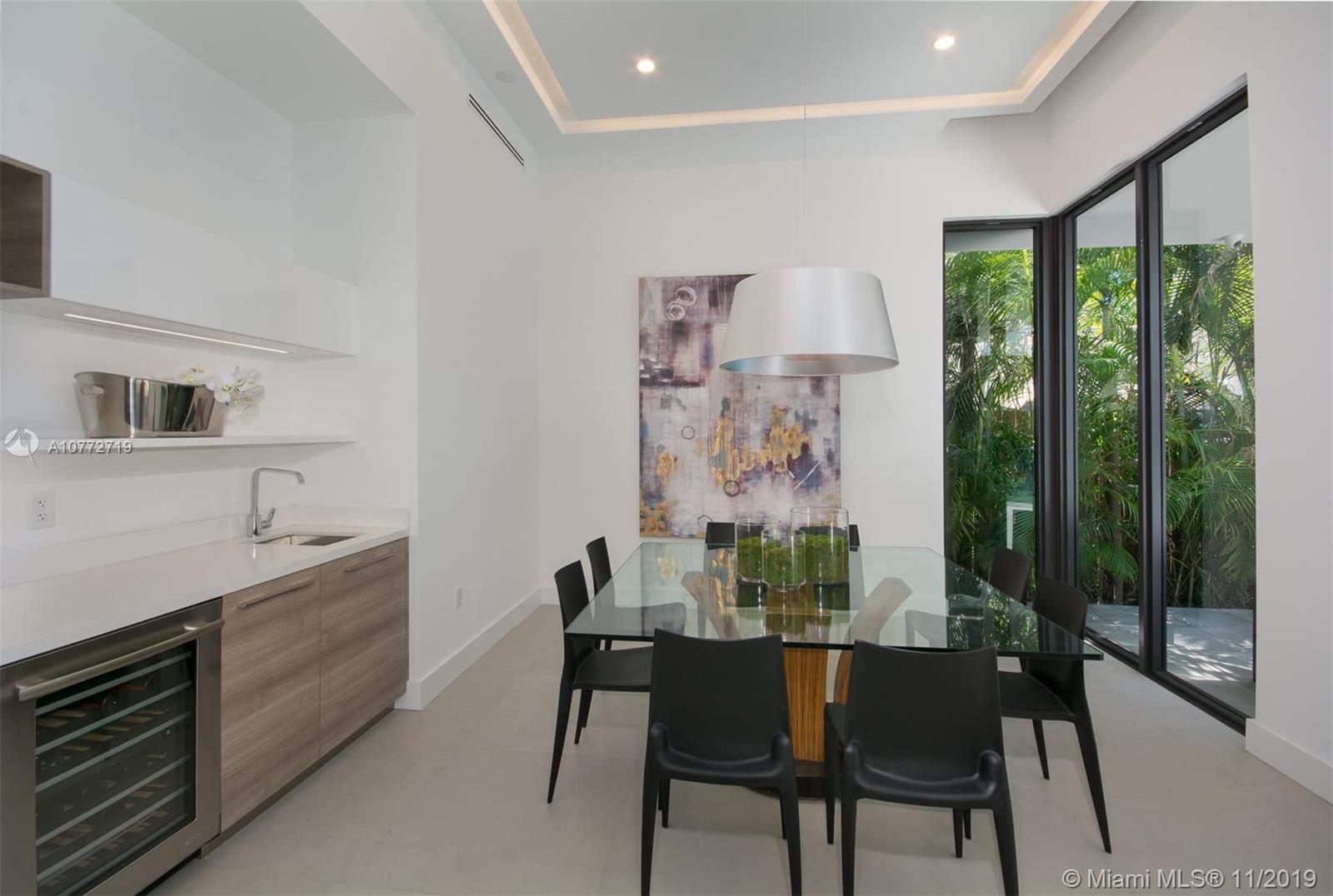 2550 Overbrook Street Miami, FL 33133 - Photo 4 of 19 Formal Dining Room With Wet Bar
