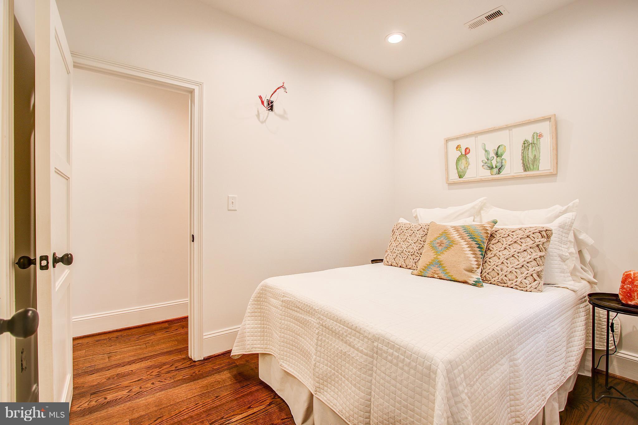 1723 U Street Northwest, Unit 3 Washington, DC 20009 - Photo 25 of 28 a bedroom with a bed and a view of bathroom