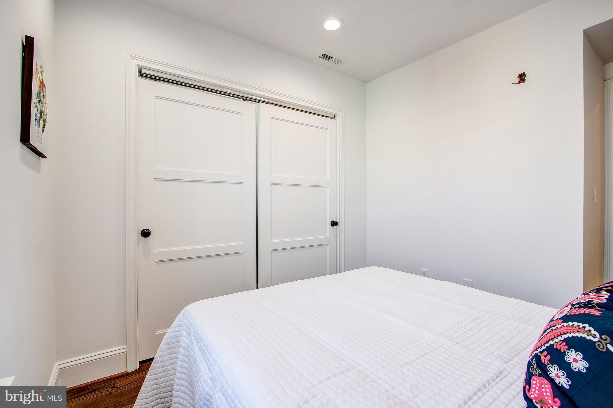 1723 U Street Northwest, Unit 3 Washington, DC 20009 - Photo 27 of 28 a bedroom with a bed and a window