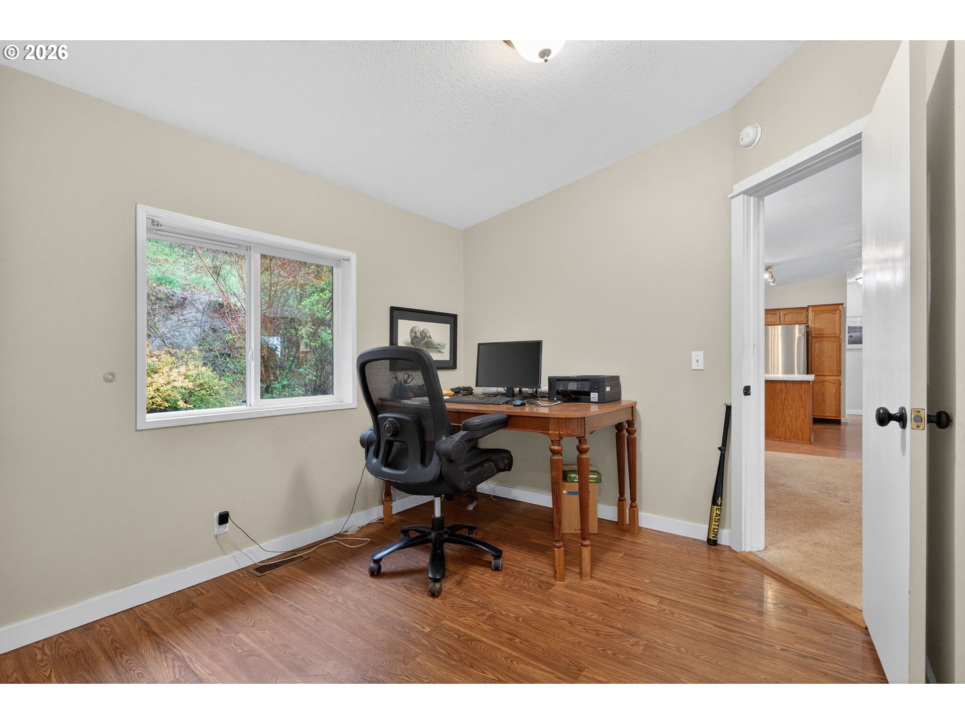 32895 Northeast Old Parrett Mountain Road Newberg, OR 97132 - Photo 18 of 48 a view of a workspace with furniture and a window