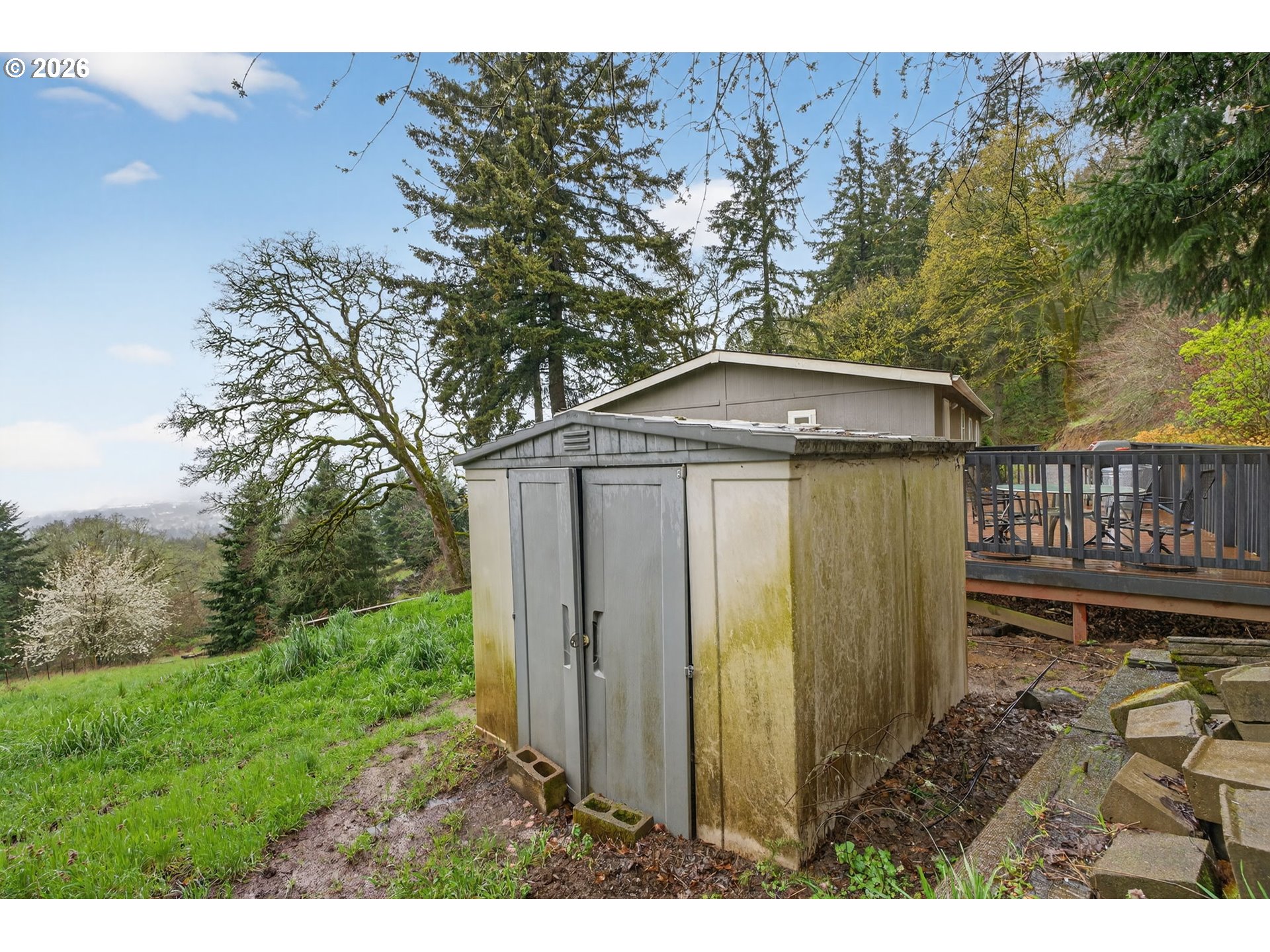 32895 Northeast Old Parrett Mountain Road Newberg, OR 97132 - Photo 37 of 48 a backyard of a house with lots of green space