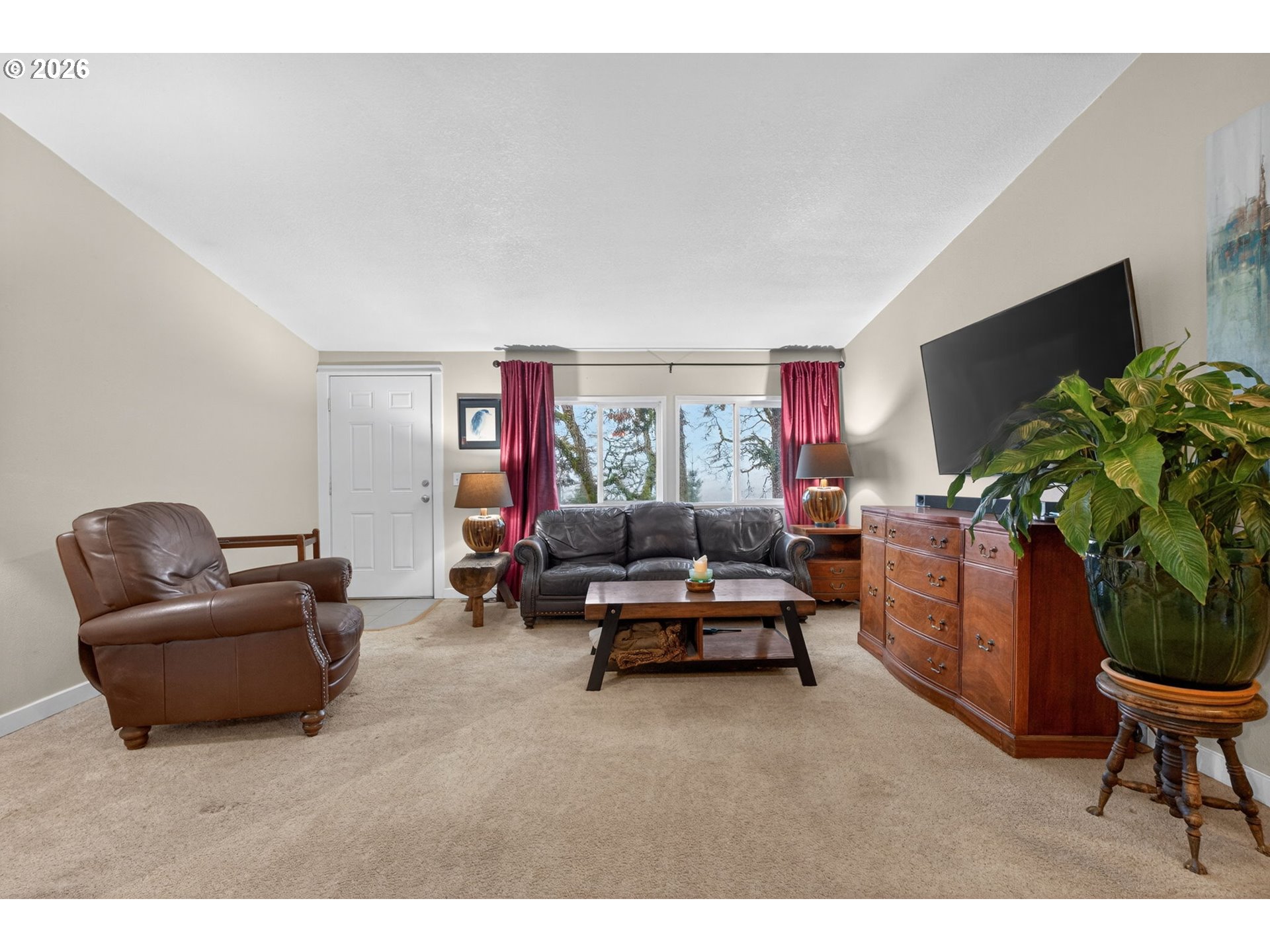 32895 Northeast Old Parrett Mountain Road Newberg, OR 97132 - Photo 4 of 48 a living room with furniture and a flat screen tv