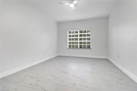 an empty room with a window