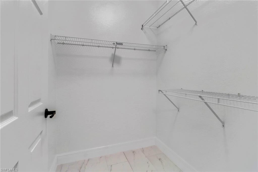 20170 Estero Gardens Circle, Unit 107 Estero, FL 33928 - Photo 19 of 44 a view of small space