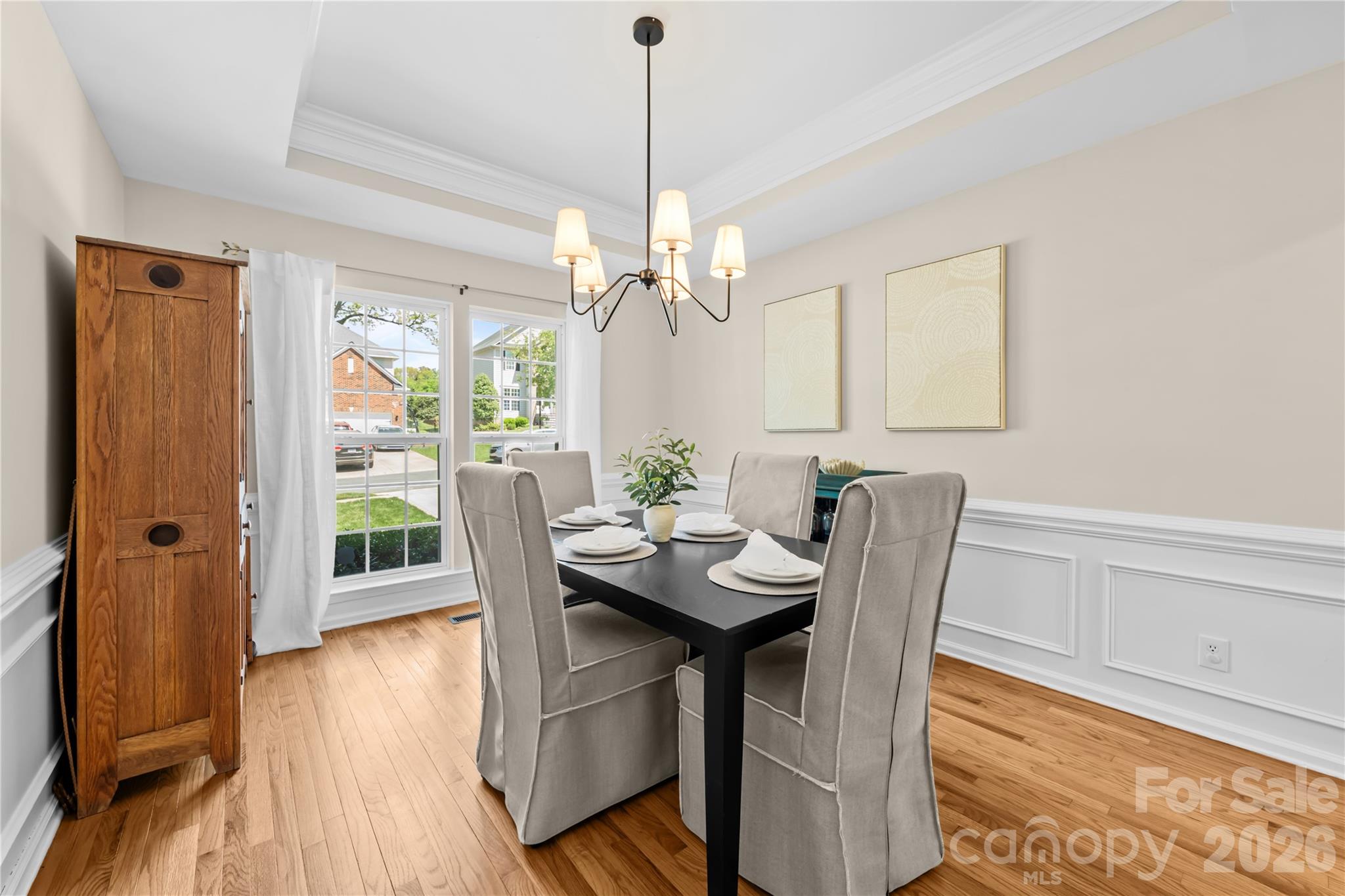 13338 Fremington Road Huntersville, NC 28078 - Photo 14 of 34 a view of a dining room with furniture window and wooden floor