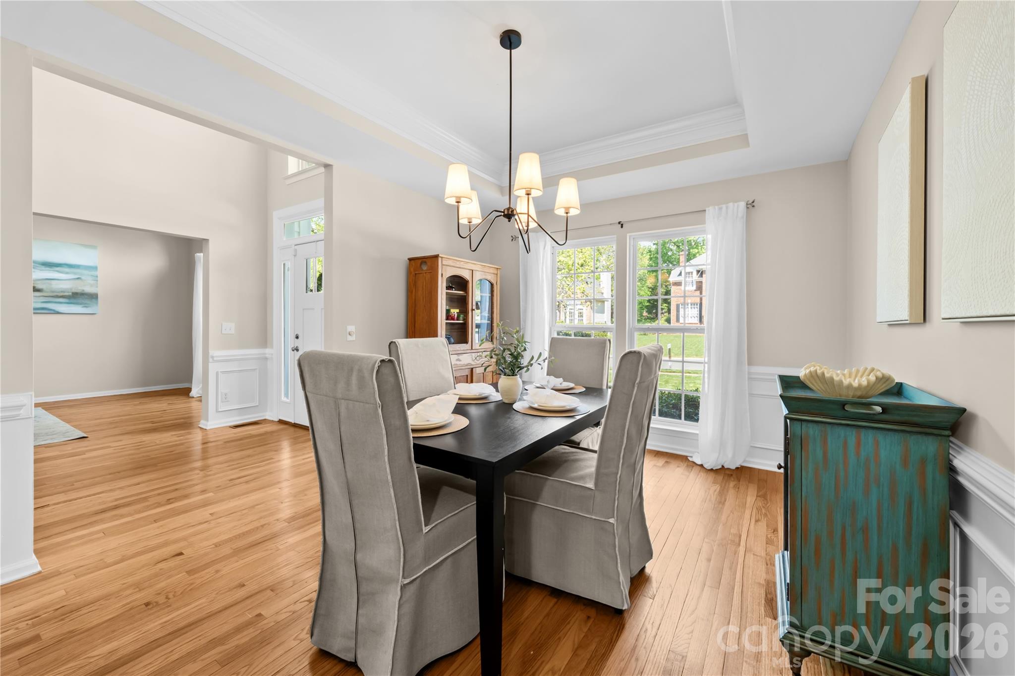 13338 Fremington Road Huntersville, NC 28078 - Photo 15 of 34 a dining room with furniture window and wooden floor