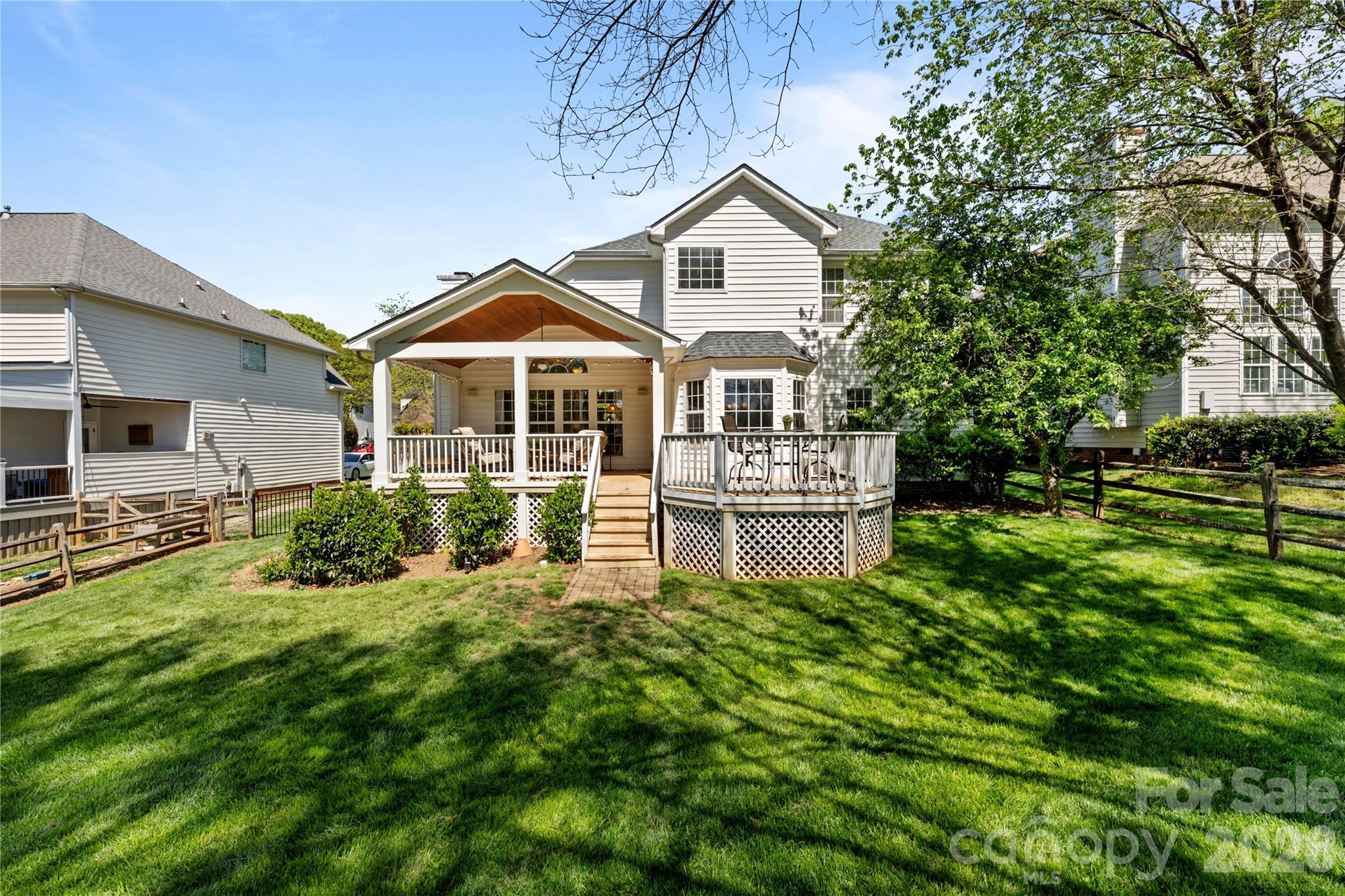 13338 Fremington Road Huntersville, NC 28078 - Photo 31 of 34 a front view of a house with a yard and trees