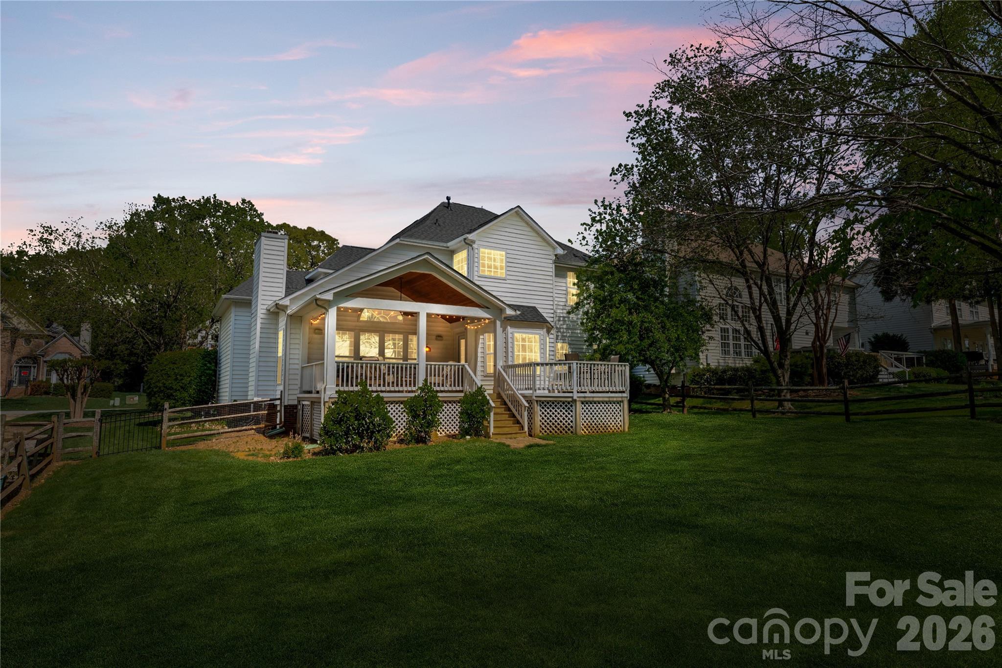 13338 Fremington Road Huntersville, NC 28078 - Photo 32 of 34 a front view of a house with a garden