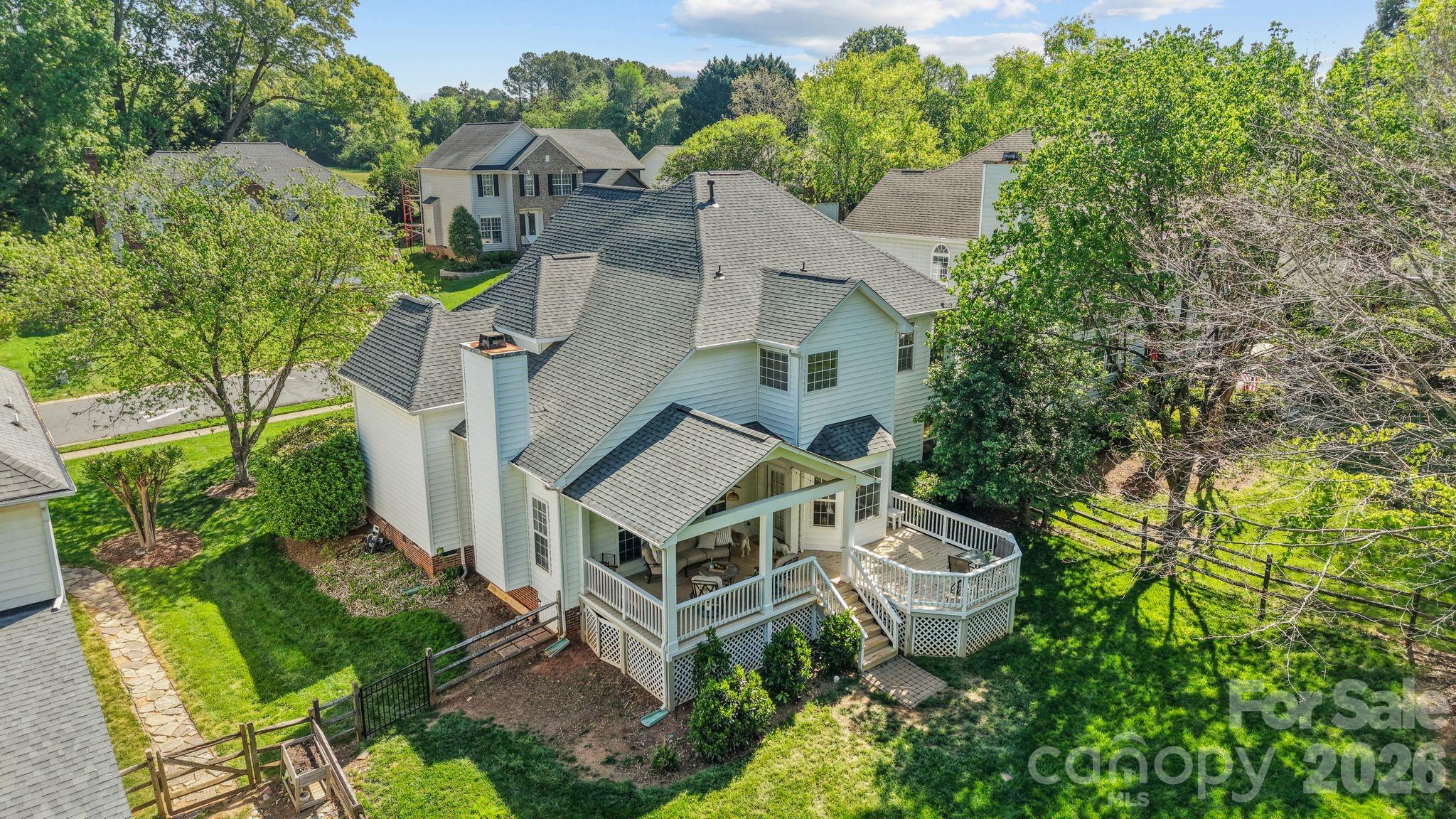 13338 Fremington Road Huntersville, NC 28078 - Photo 33 of 34 an aerial view of a house with a big yard and large trees