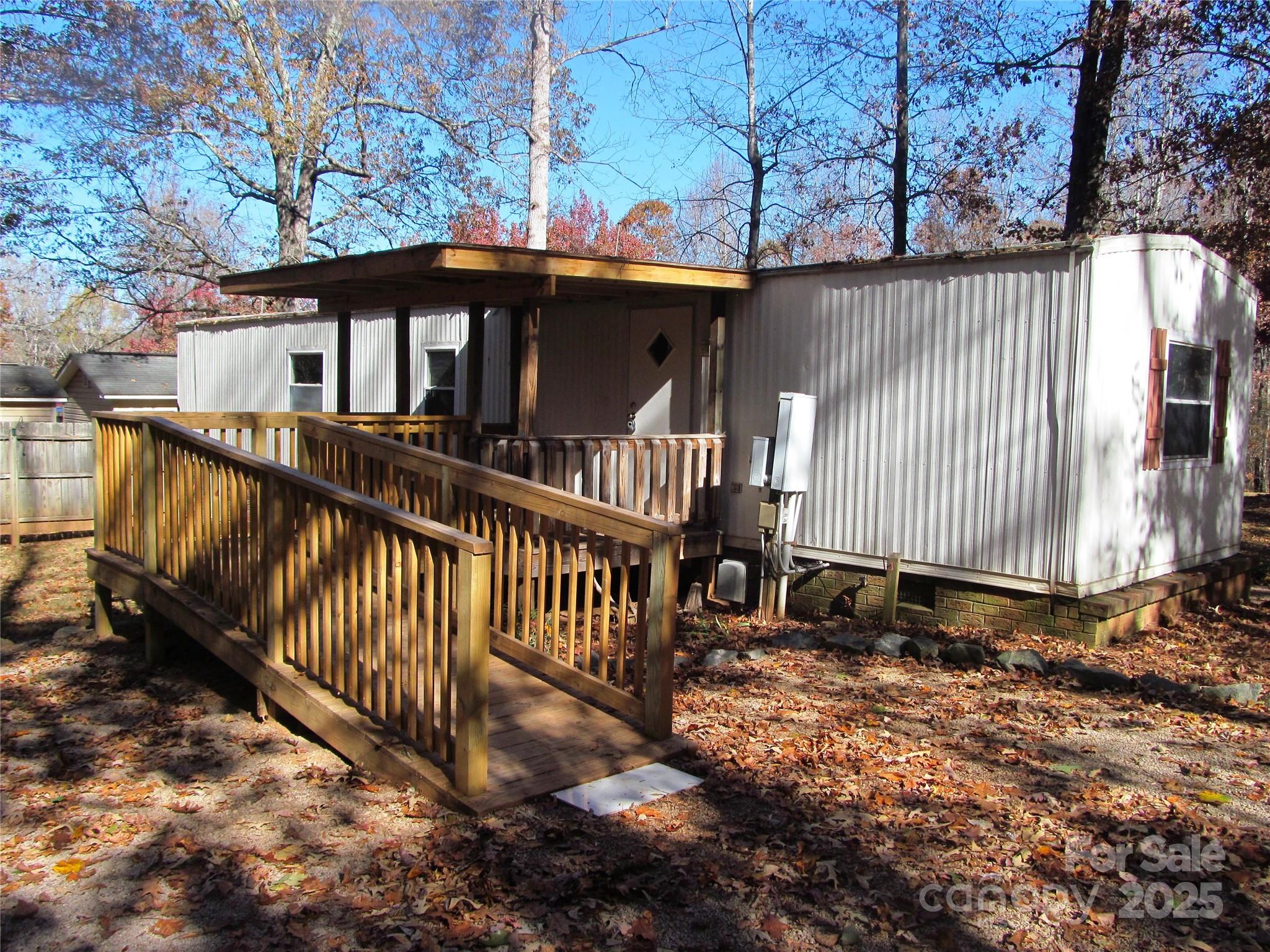 1054 Stirewalt Road, Unit 6 China Grove, NC 28023 - Photo 6 of 10 a front view of a house with a yard