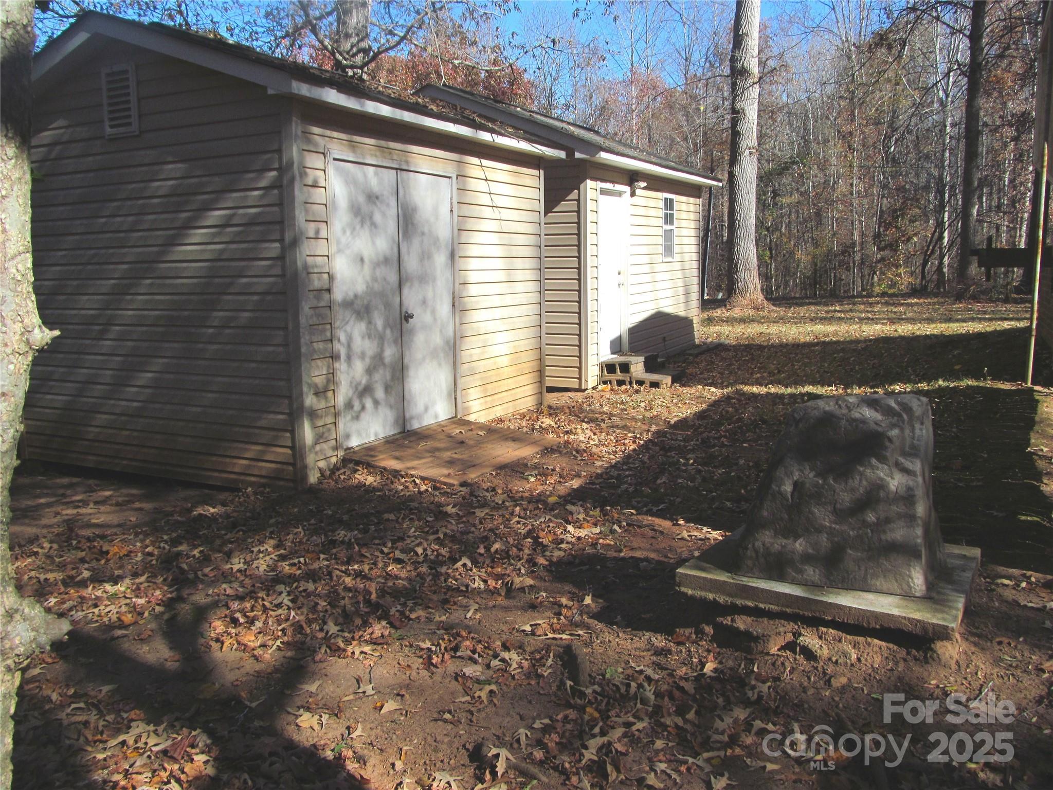 1054 Stirewalt Road, Unit 6 China Grove, NC 28023 - Photo 8 of 10 a view of backyard of a house