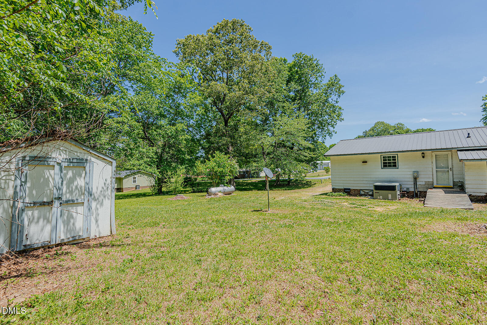 1302 Blacksmith Road Efland, NC 27243 - Photo 34 of 46 a view of a house with a yard