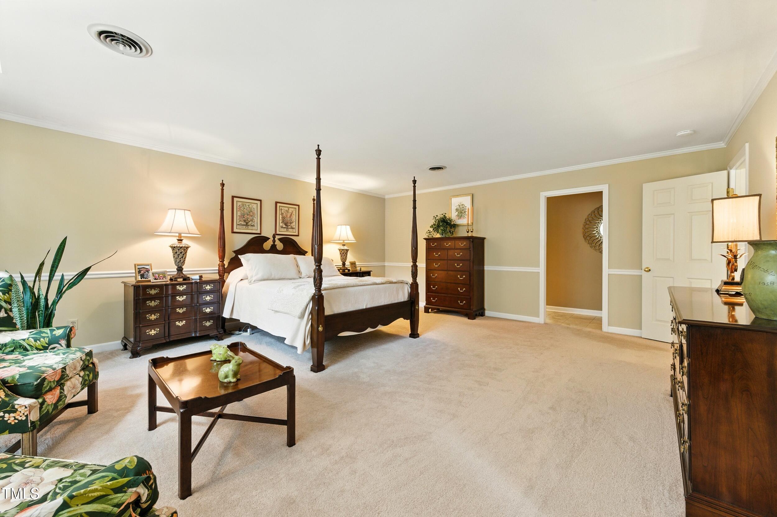5317 Deep Valley Raleigh, NC 27606 - Photo 7 of 59 a view of a livingroom with furniture and a flat screen tv