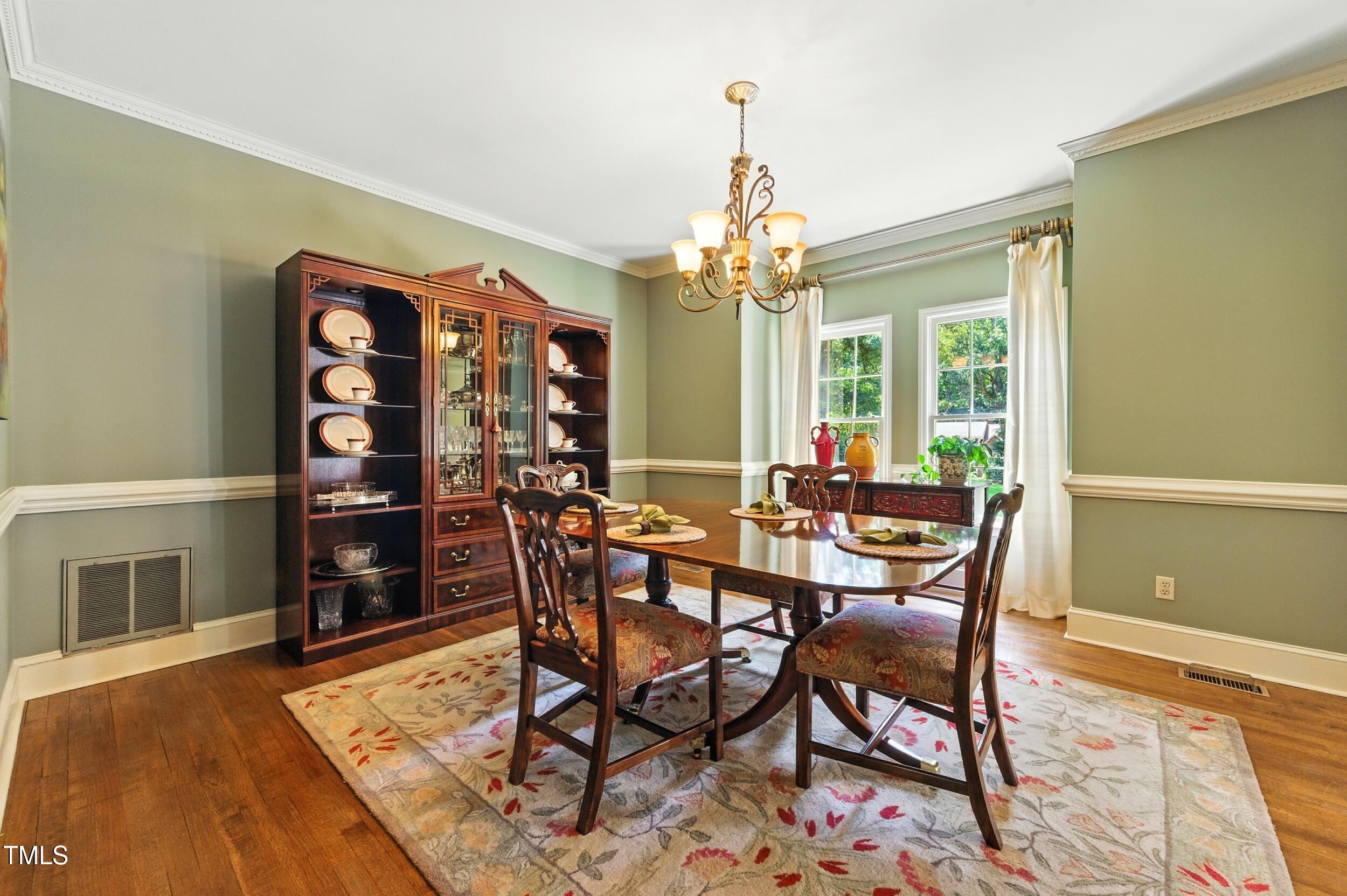 5317 Deep Valley Raleigh, NC 27606 - Photo 16 of 59 a view of a dining room with furniture