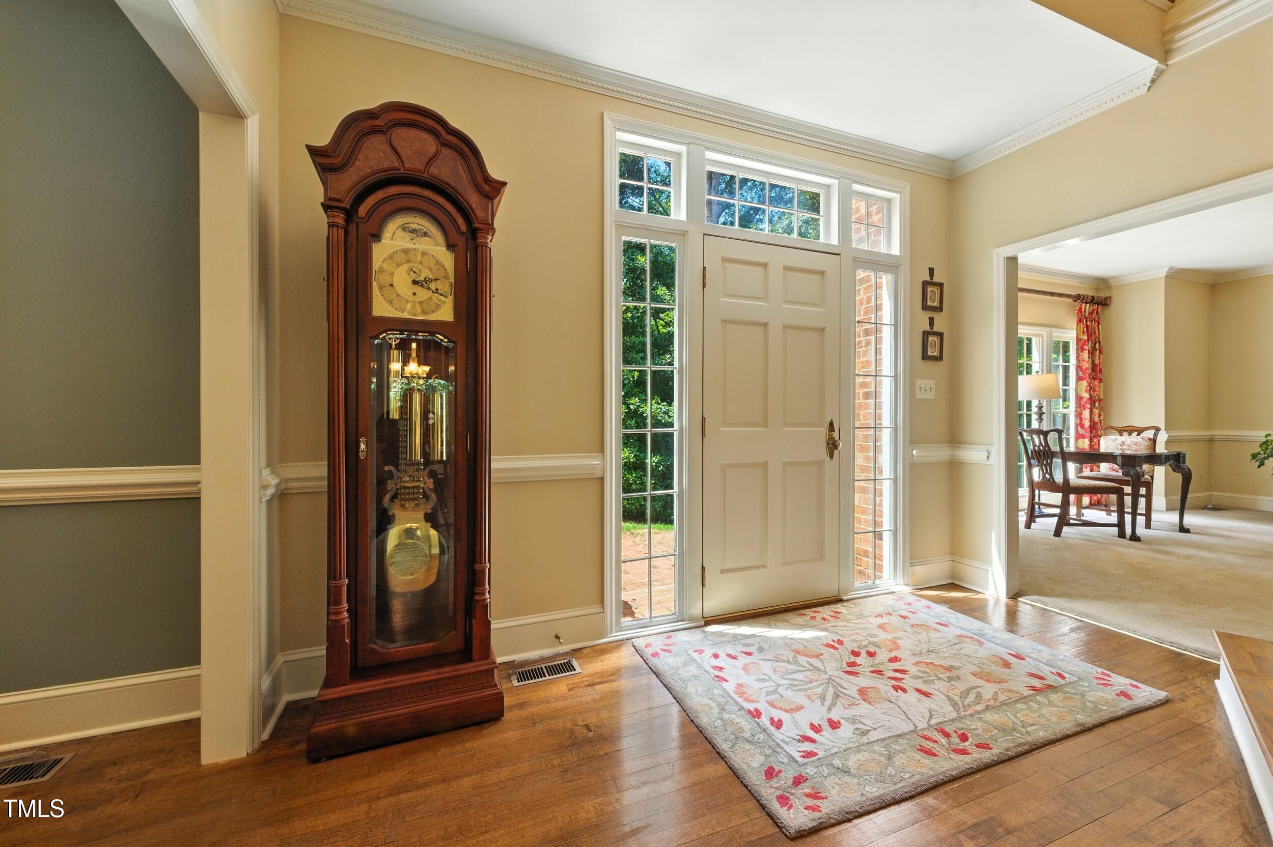 5317 Deep Valley Raleigh, NC 27606 - Photo 17 of 59 a view of an entryway with a rug