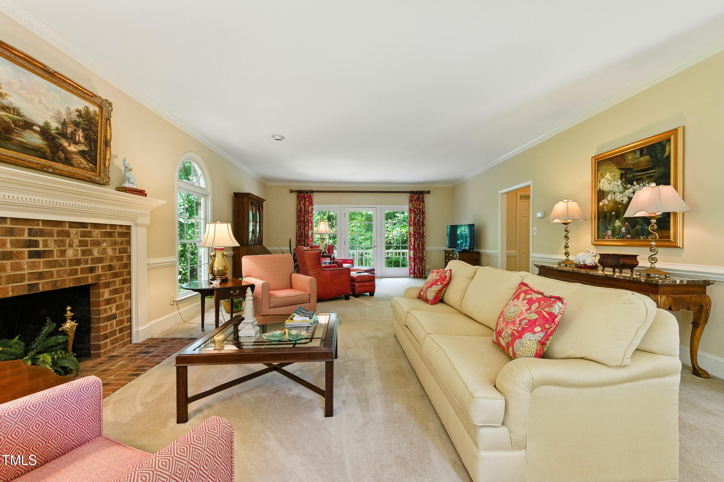 5317 Deep Valley Raleigh, NC 27606 - Photo 19 of 59 a living room with furniture fireplace and window