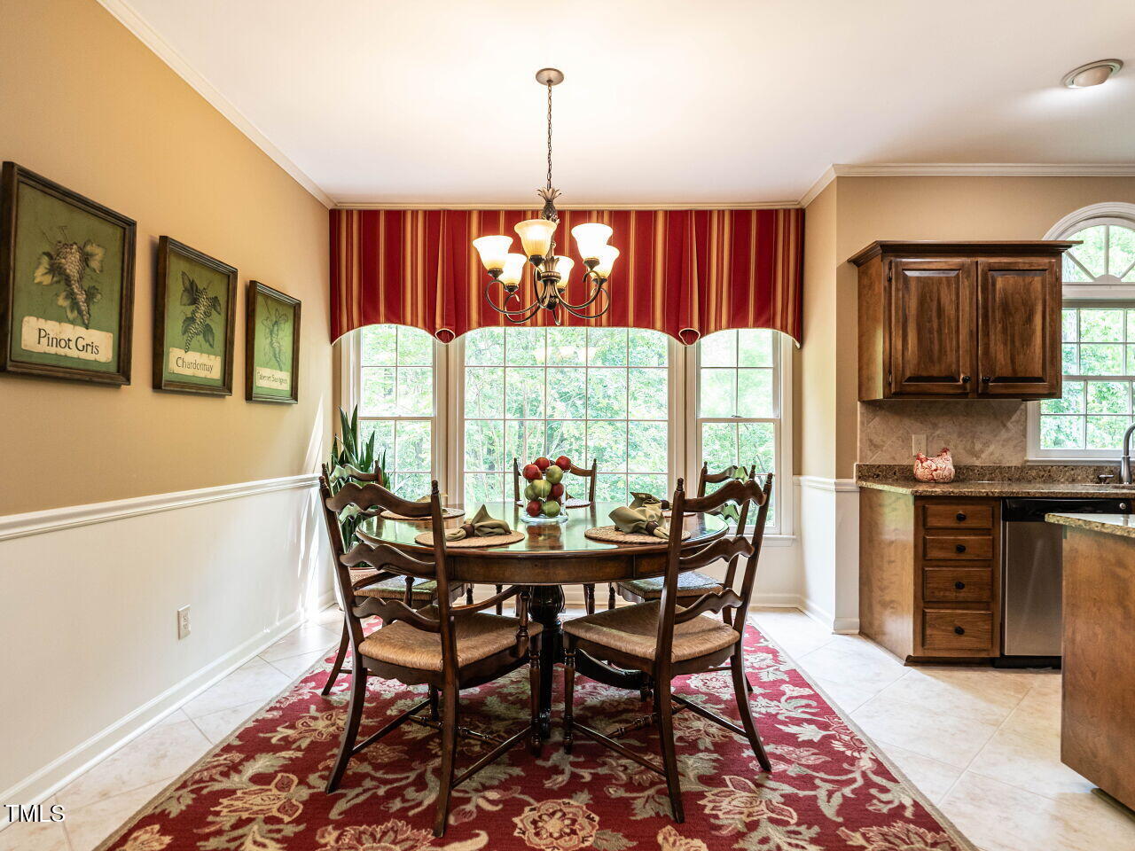 5317 Deep Valley Raleigh, NC 27606 - Photo 25 of 59 a dining room with furniture and window