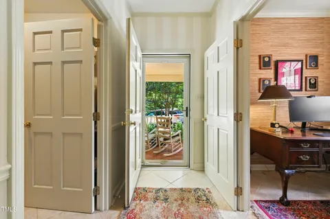 a view of a house with a yard porch and sitting area