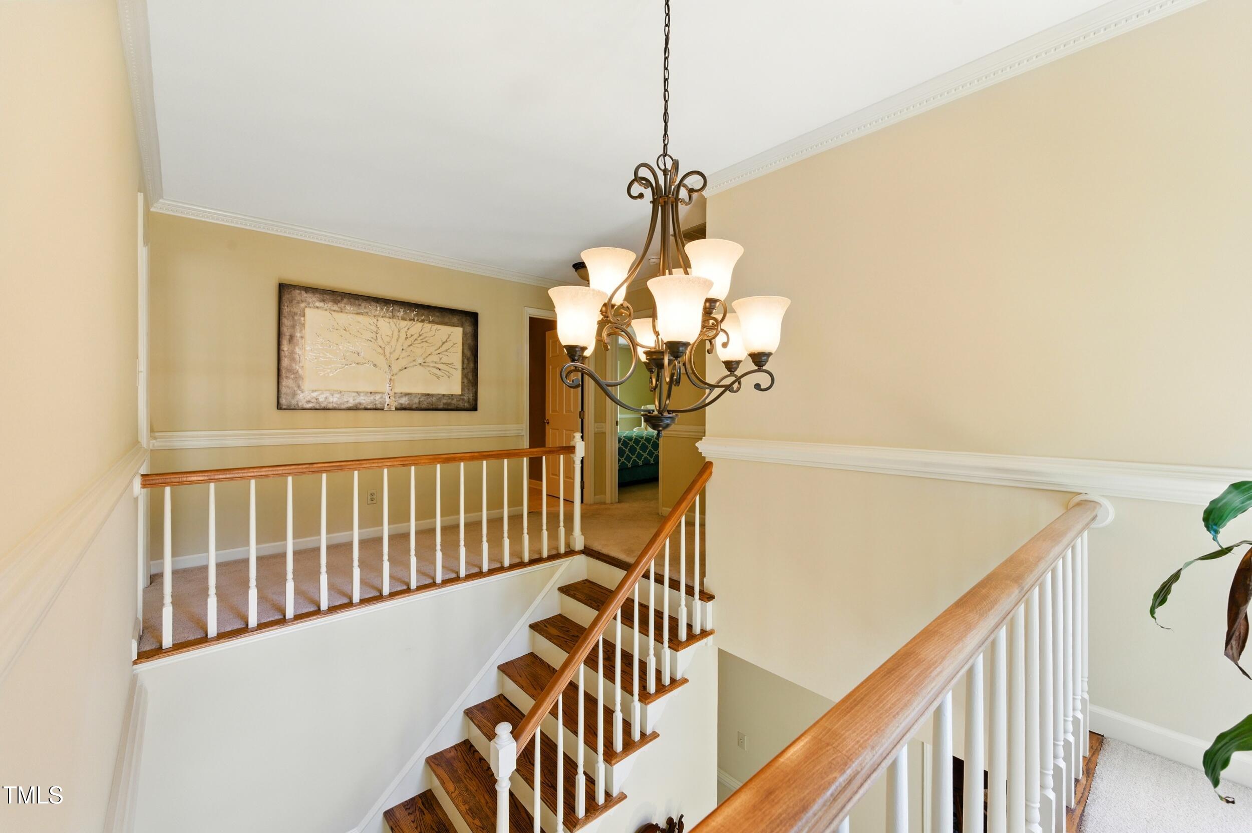 5317 Deep Valley Raleigh, NC 27606 - Photo 33 of 59 a view of entryway and hall with wooden floor