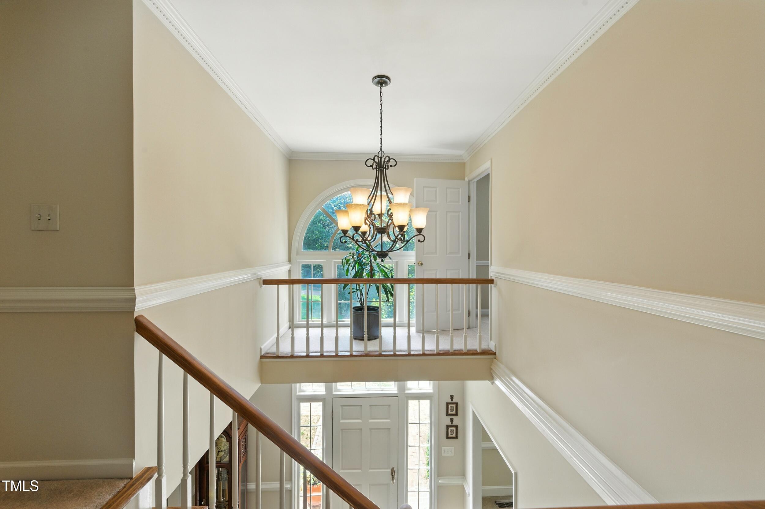 5317 Deep Valley Raleigh, NC 27606 - Photo 41 of 59 a view of entryway with wooden floor