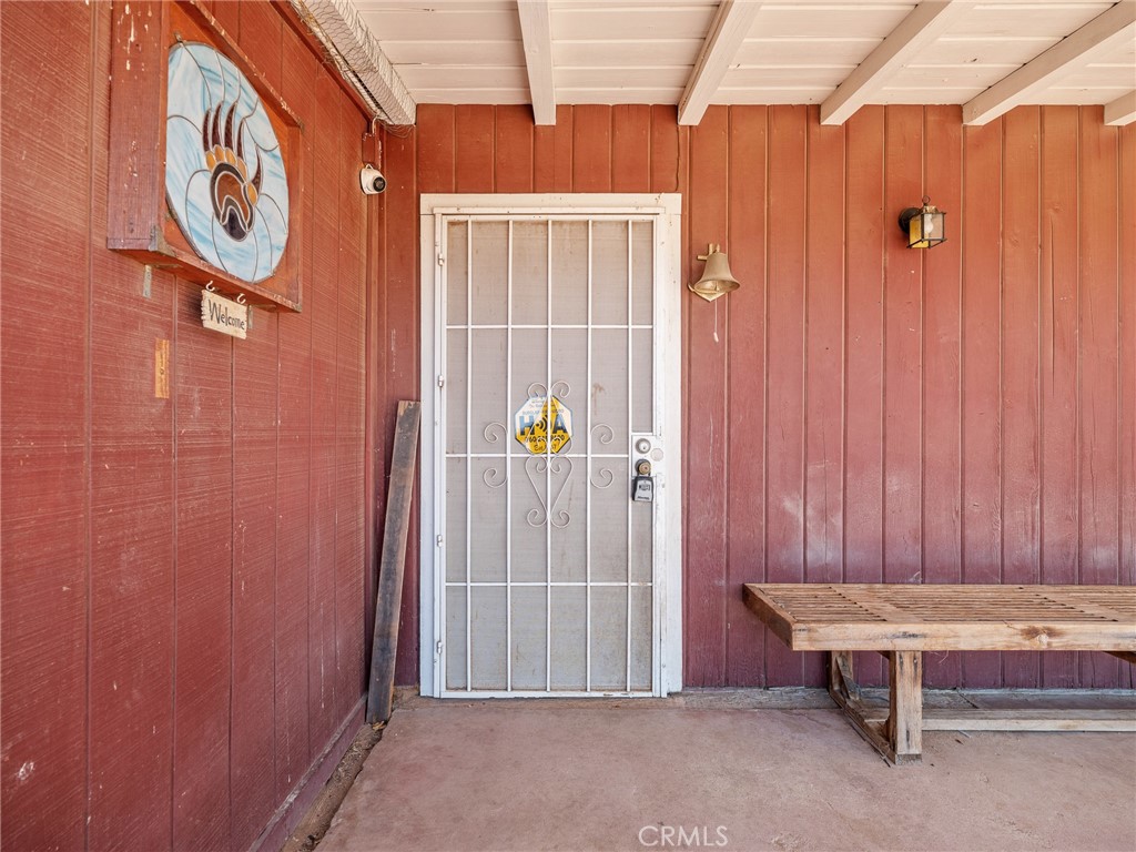 19876 Stoddard Wells Road Apple Valley, CA 92307 - Photo 3 of 40 a view of outdoor space and wooden shelves