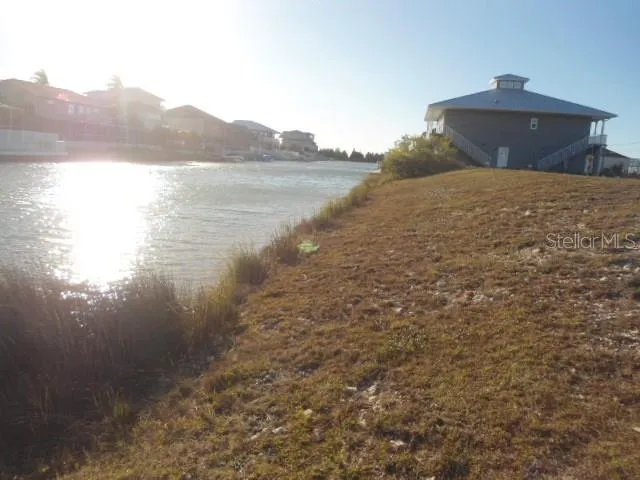 a view of a lake from a yard