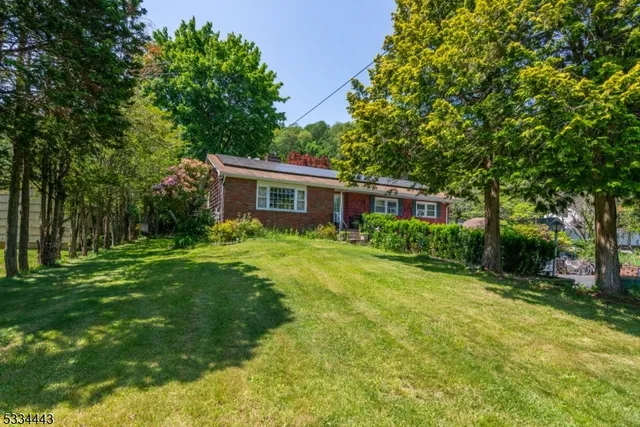 a house view with a garden space