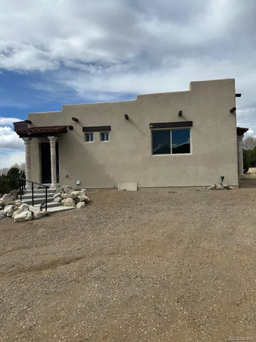 a street view with large trees