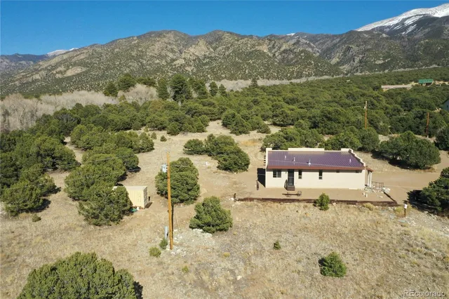 a view of a city with a lake