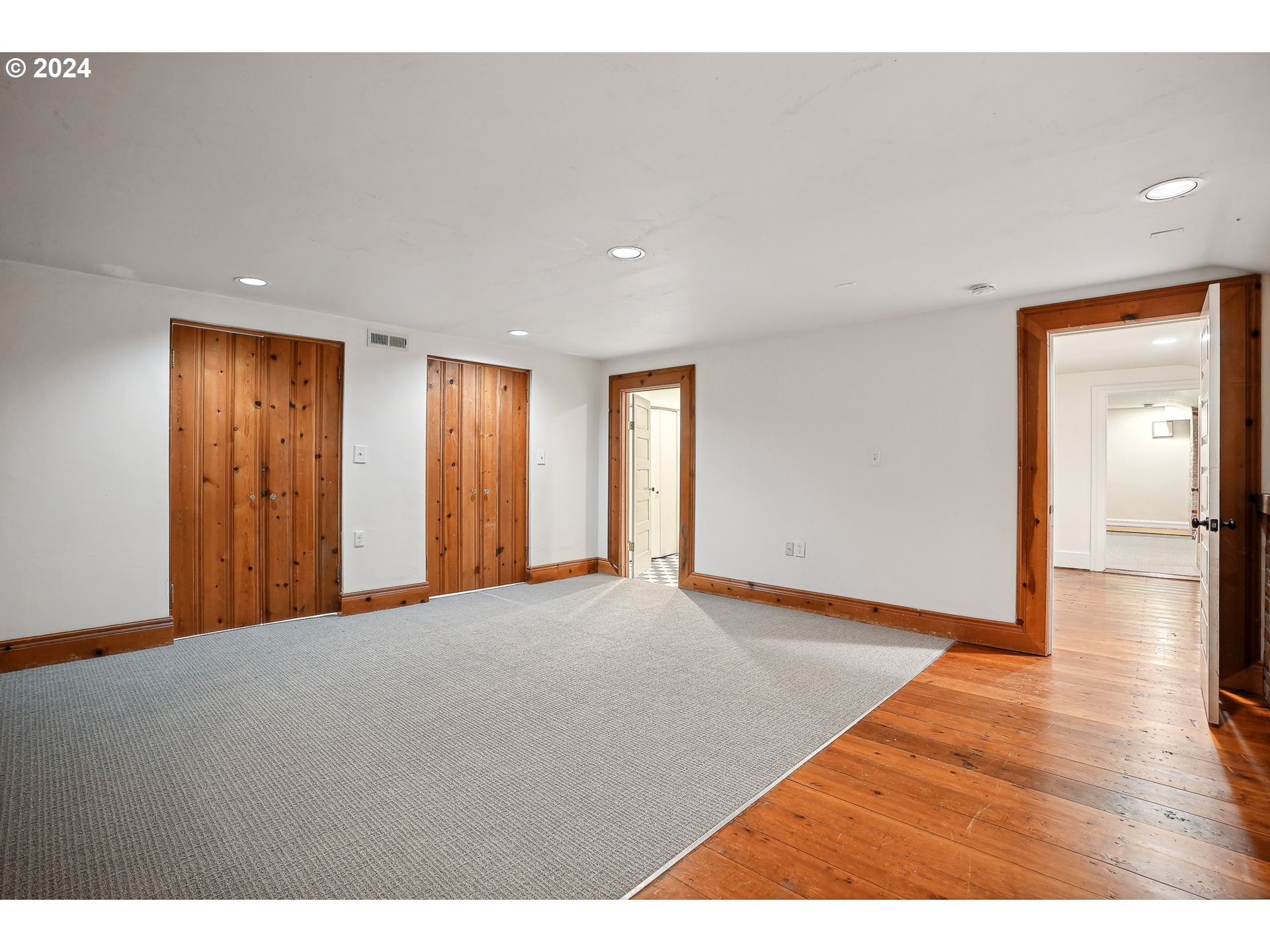 3903 North Michigan Avenue Portland, OR 97227 - Photo 13 of 47 a view of an empty room with wooden floor