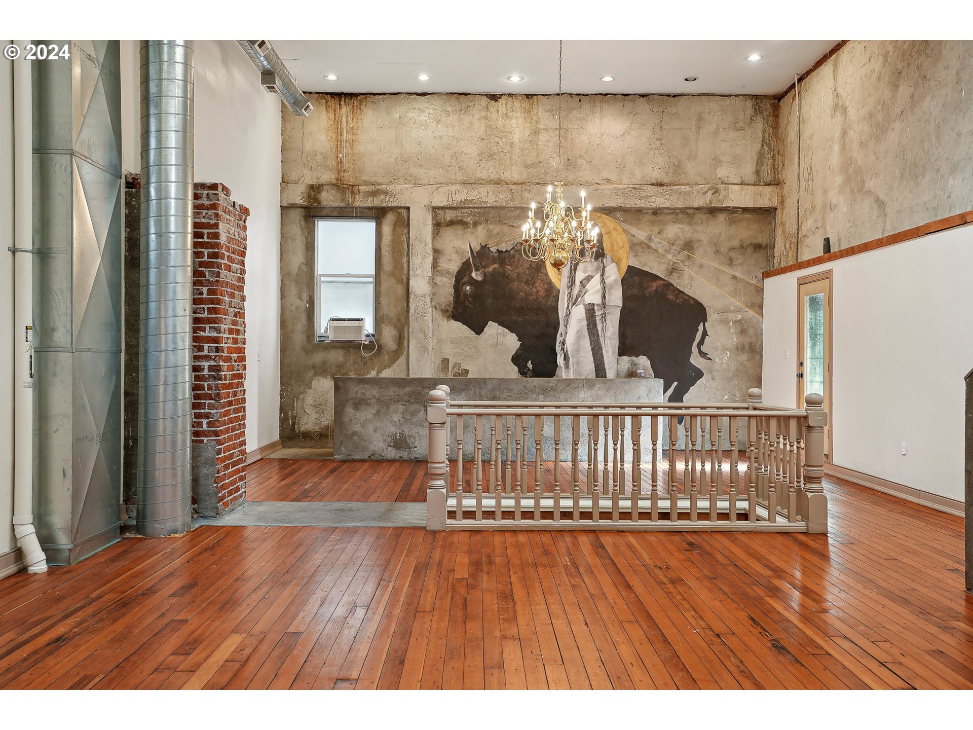 3903 North Michigan Avenue Portland, OR 97227 - Photo 22 of 47 a floor to ceiling window with wooden floor