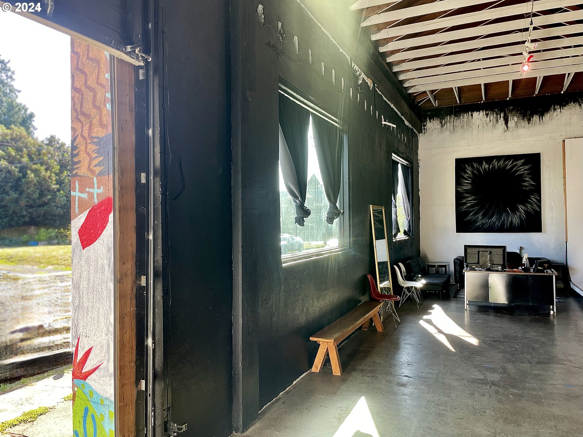 3903 North Michigan Avenue Portland, OR 97227 - Photo 39 of 47 a living room with furniture and a flat screen tv
