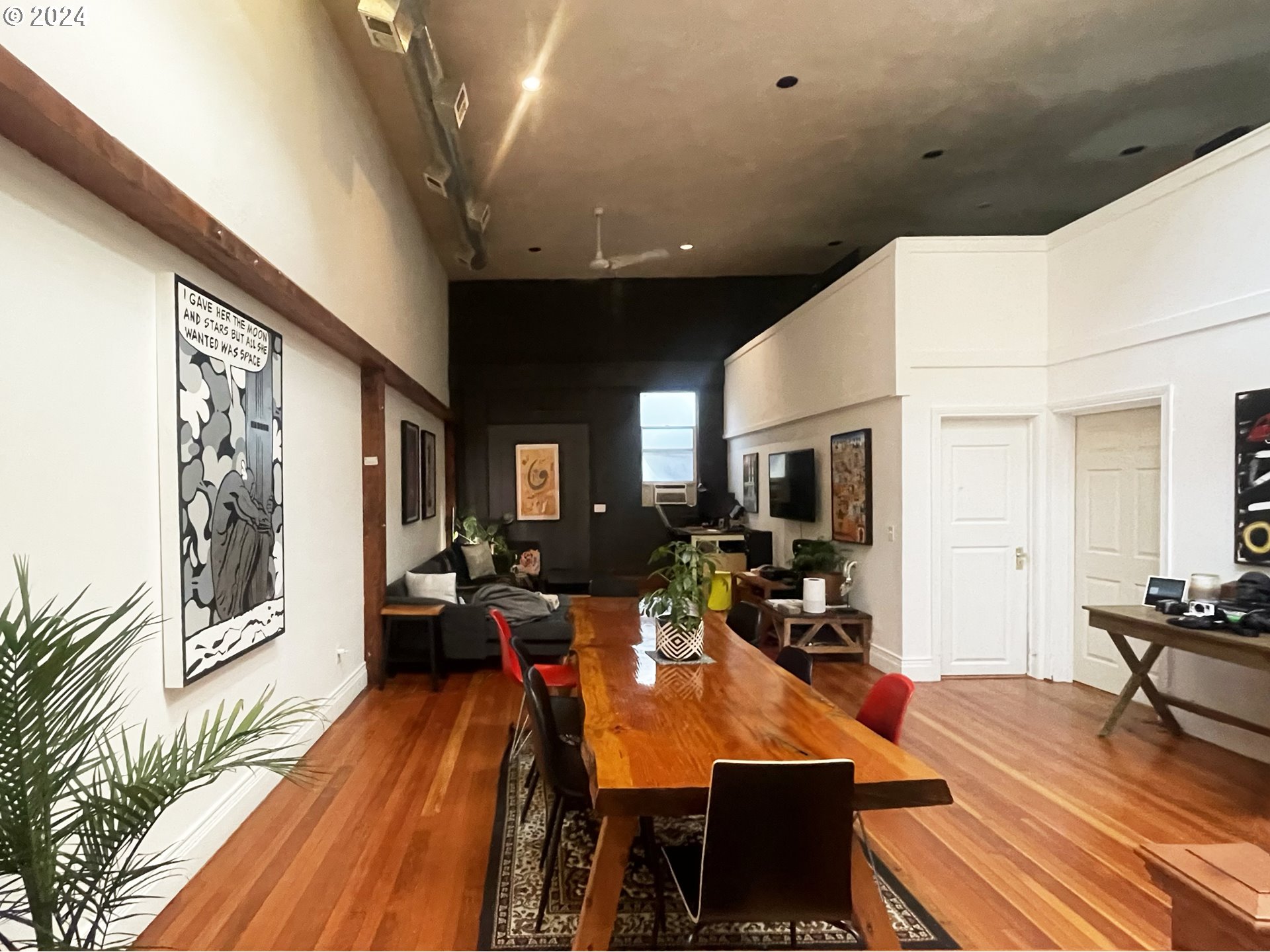 3903 North Michigan Avenue Portland, OR 97227 - Photo 40 of 47 a living room with furniture a wooden floor and next to a window