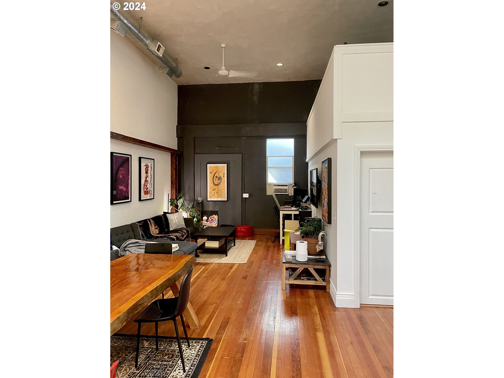 3903 North Michigan Avenue Portland, OR 97227 - Photo 43 of 47 a living room with furniture and a flat screen tv