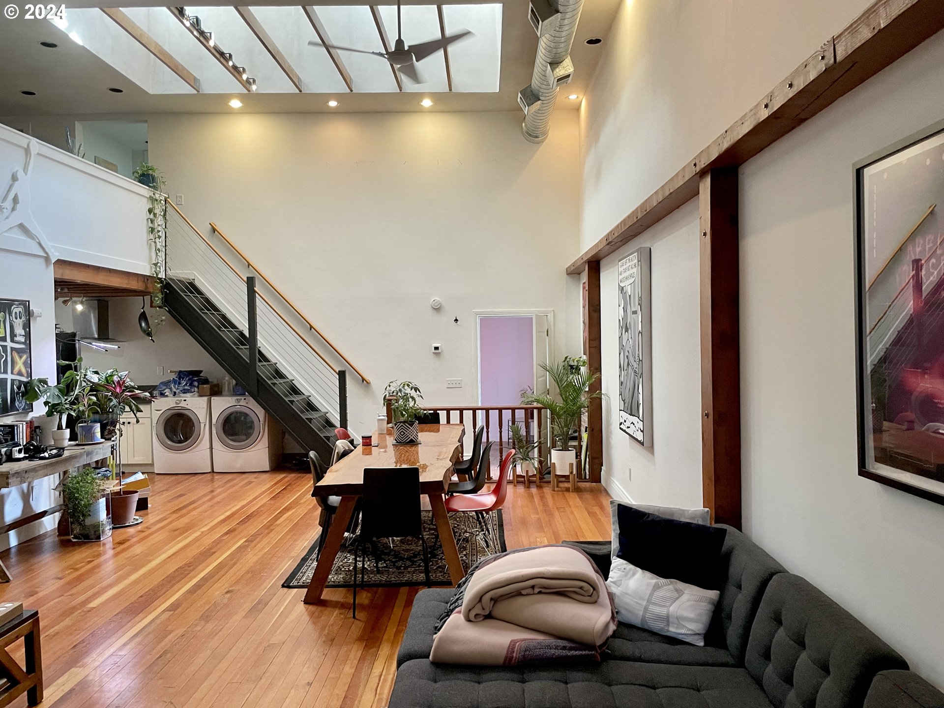 3903 North Michigan Avenue Portland, OR 97227 - Photo 44 of 47 a living room with furniture and wooden floor