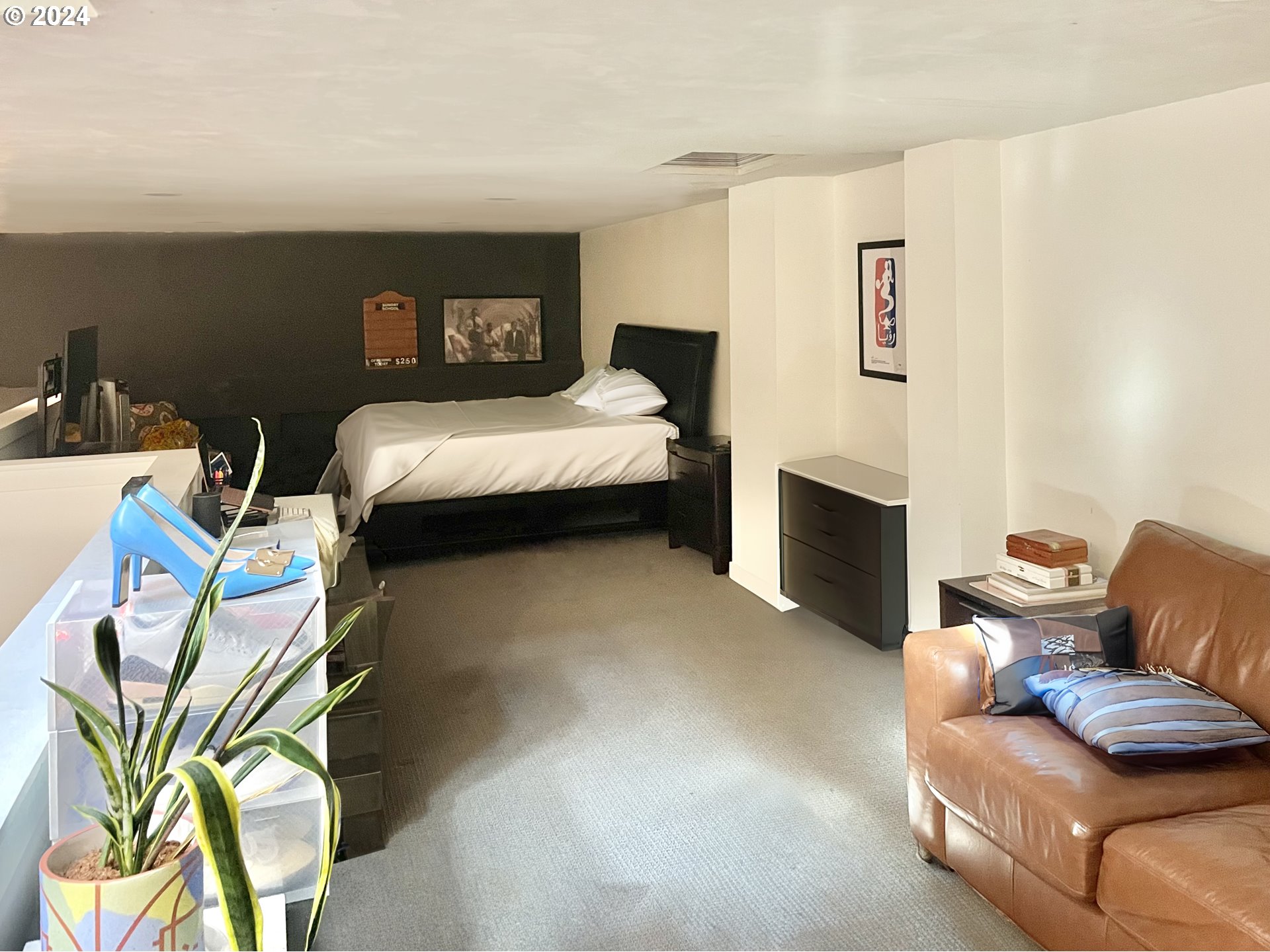 3903 North Michigan Avenue Portland, OR 97227 - Photo 47 of 47 a bedroom with a bed and couch