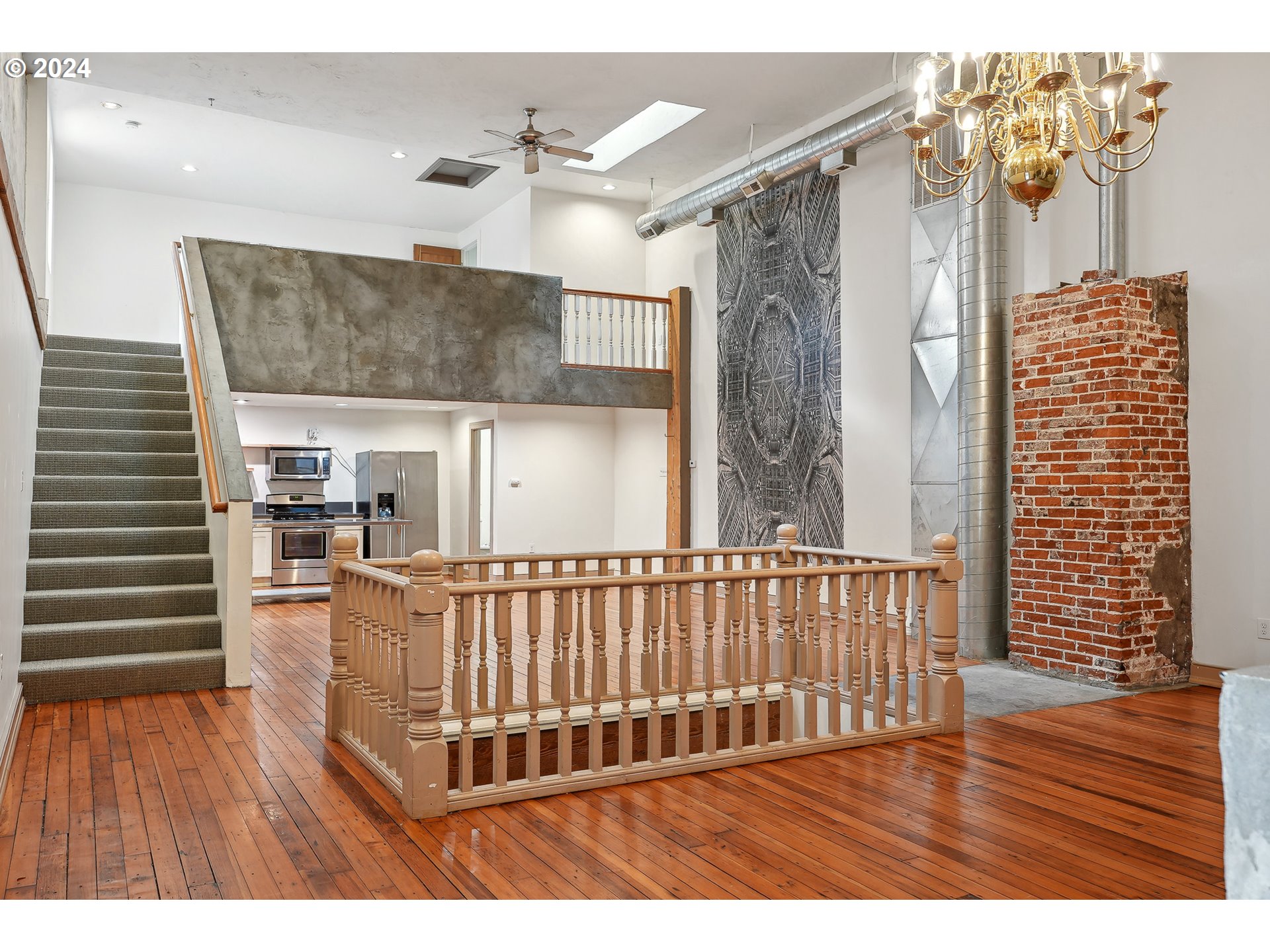3903 North Michigan Avenue Portland, OR 97227 - Photo 6 of 47 a view of a balcony with furniture and wooden floor