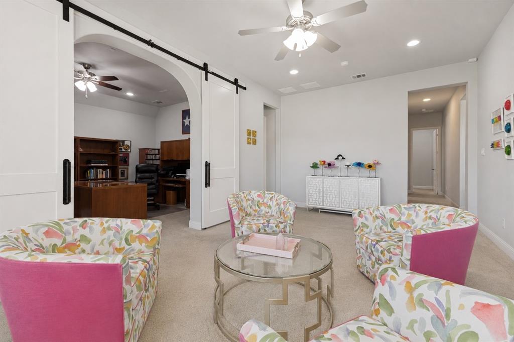 506 Life Spring Drive Rockwall, TX 75087 - Photo 18 of 36 a living room with furniture and kitchen view