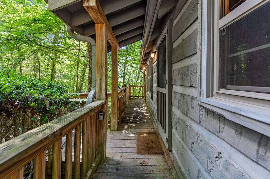 380 Branch Creek Road Blue Ridge, GA 30513 - Photo 11 of 41 a view of a porch with wooden floor