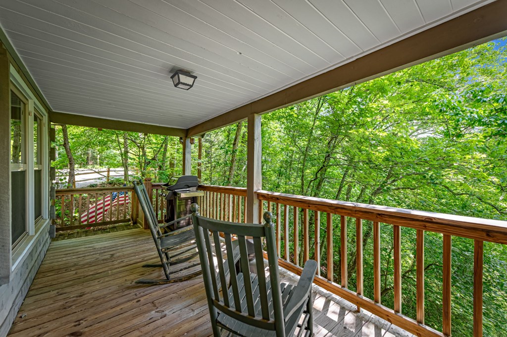 380 Branch Creek Road Blue Ridge, GA 30513 - Photo 20 of 41 a view of a two room with furniture and wooden floor