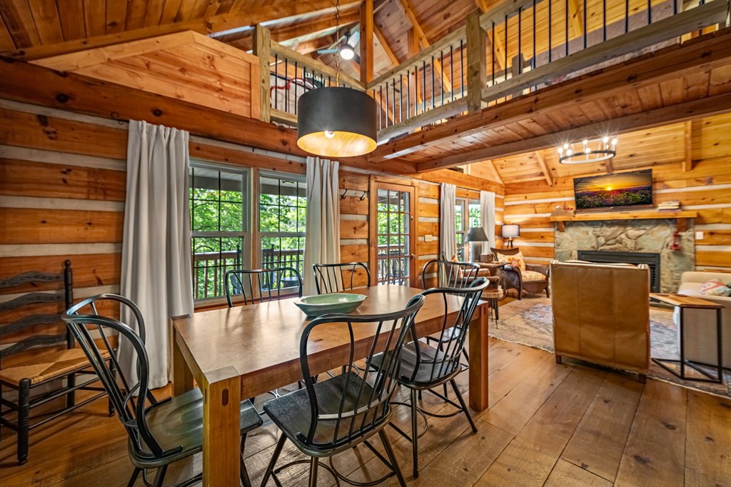 380 Branch Creek Road Blue Ridge, GA 30513 - Photo 28 of 41 a view of a patio with dining table and chairs