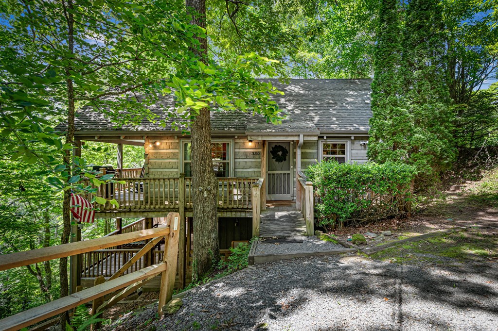 380 Branch Creek Road Blue Ridge, GA 30513 - Photo 3 of 41 a view of house with a front door