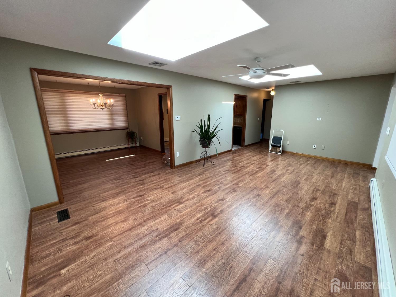 283 Rudetown Road Hamburg, NJ 07419 - Photo 5 of 38 a view of empty room with wooden floor