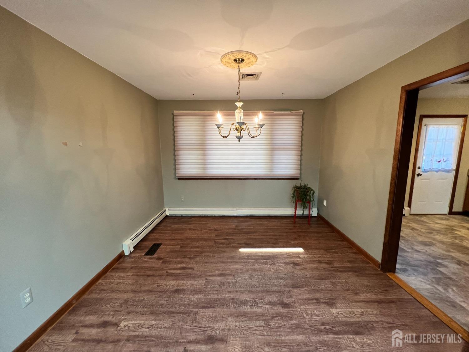 283 Rudetown Road Hamburg, NJ 07419 - Photo 6 of 38 a view of an empty room and window