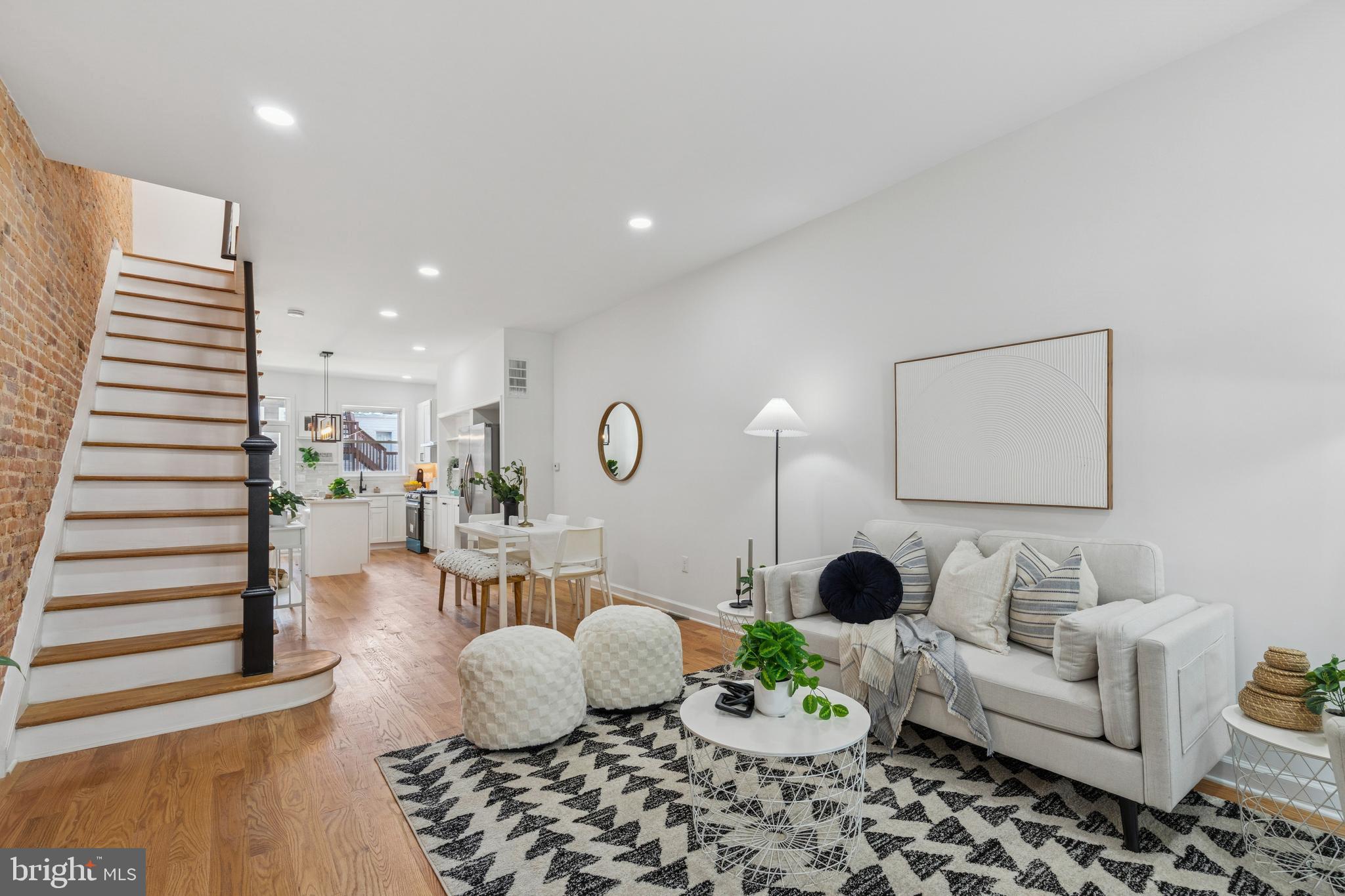 630 South Potomac Street Baltimore, MD 21224 - Photo 11 of 52 a living room with furniture and wooden floor