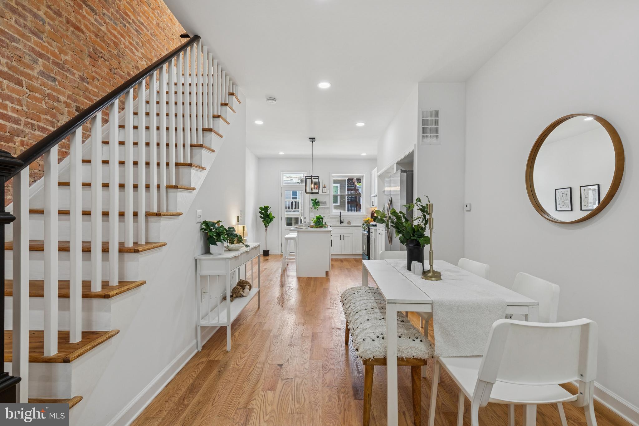 630 South Potomac Street Baltimore, MD 21224 - Photo 13 of 52 a view of a living room and dining room