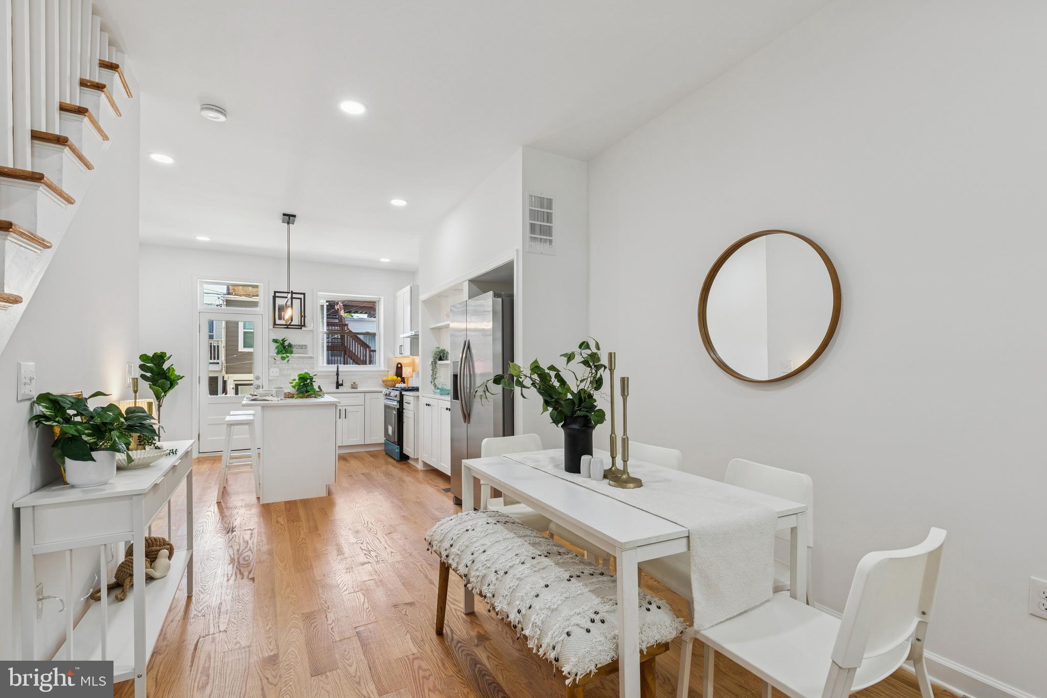 630 South Potomac Street Baltimore, MD 21224 - Photo 16 of 52 a view of a dining room with furniture and wooden floor